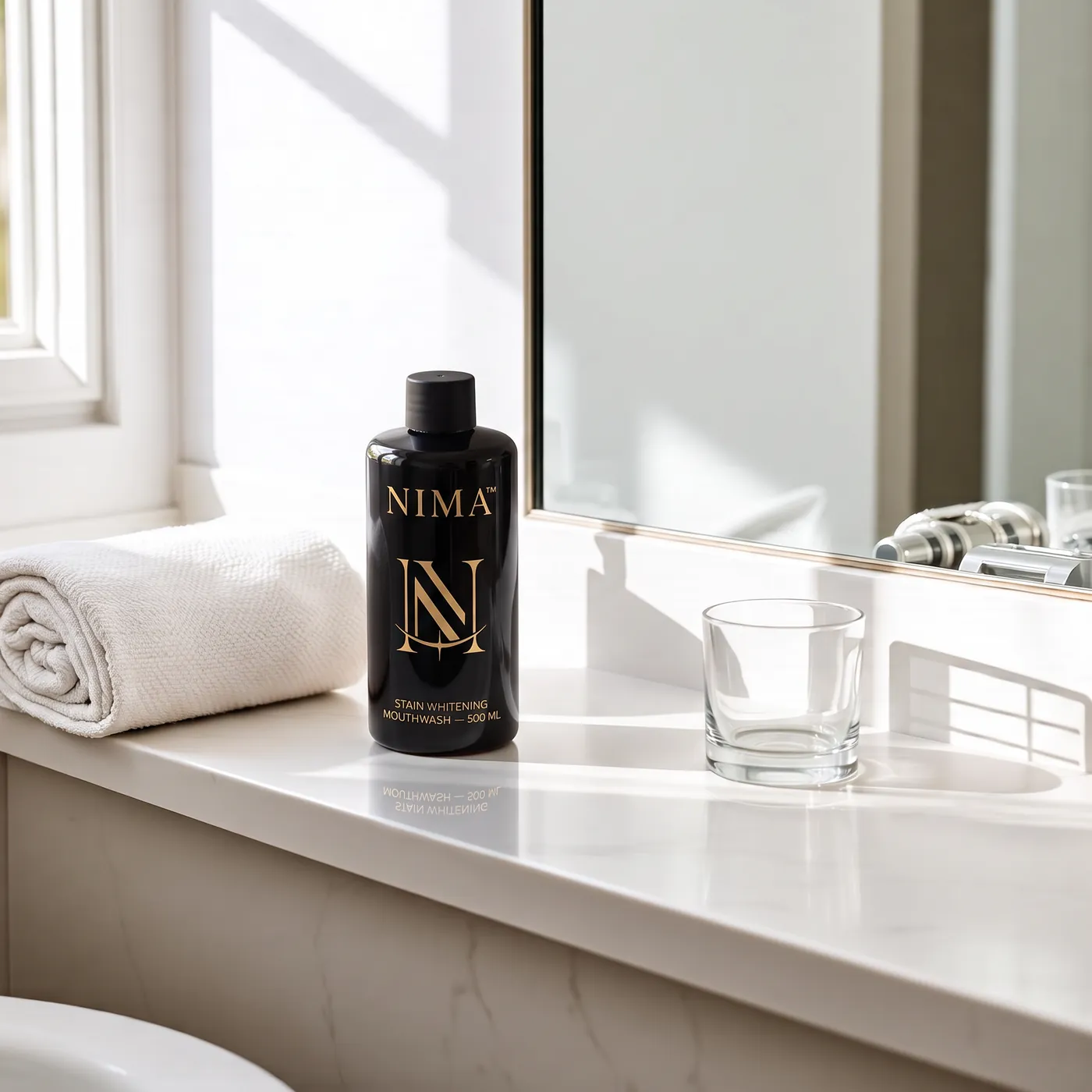 The rinse on a sunlit marble bathroom counter