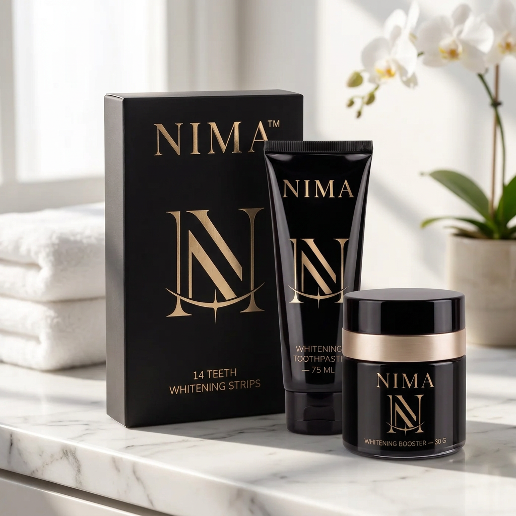 The branded NIMA Starter Kit with whitening strips, toothpaste and booster on a sunlit marble bathroom counter